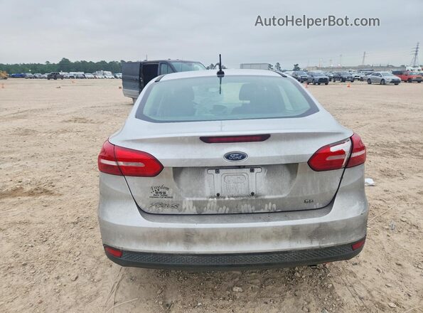 1FADP3F25JL272430 2018 FORD FOCUS Silver Vista trasera