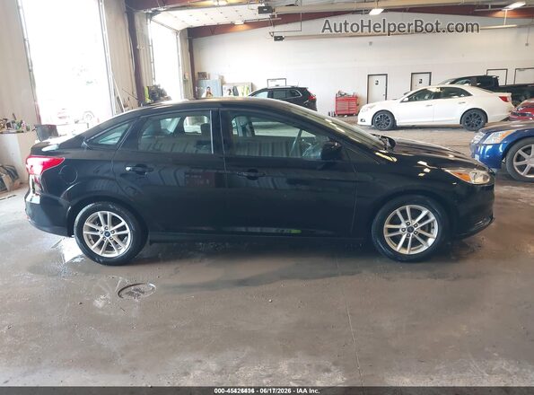 1FADP3F25JL327782 2018 FORD FOCUS Черный Вид задней части салона
