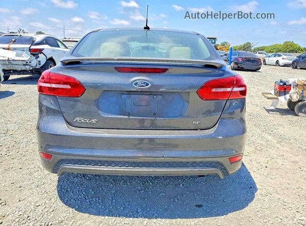 1FADP3F26GL315391 2016 FORD FOCUS Серый Вид сзади