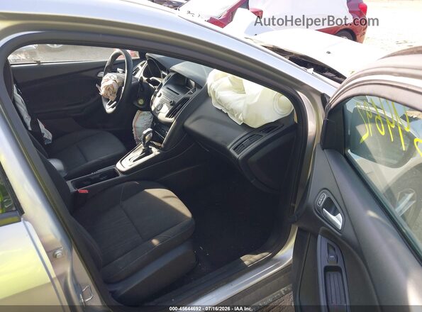 1FADP3F26GL332045 2016 FORD FOCUS Серебряный Вид салона спереди