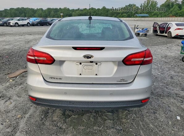 1FADP3F26GL376160 2016 FORD FOCUS Silver Vista trasera