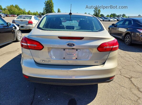 1FADP3F26HL300391 2017 FORD FOCUS Beige Вид ззаду