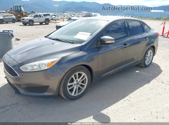 1FADP3F27GL339103 2016 FORD FOCUS Gray Առջևի ձախ երեք քառորդ տեսարան