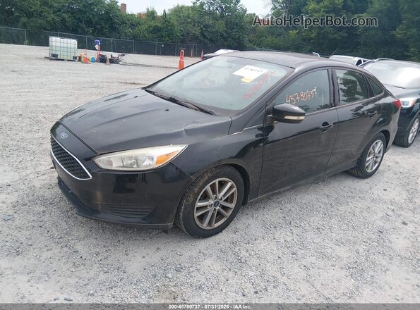1FADP3F28GL274830 2016 FORD FOCUS Black Vista tres cuartos delantera izquierda