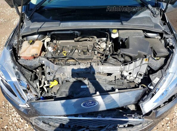 1FADP3F28JL328067 2018 FORD FOCUS Gray Rear interior view