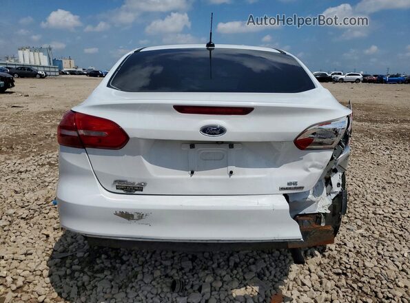 1FADP3F29GL330760 2016 FORD FOCUS White Rear view