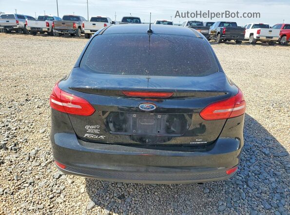 1FADP3F2XGL222664 2016 FORD FOCUS Черный Вид сзади