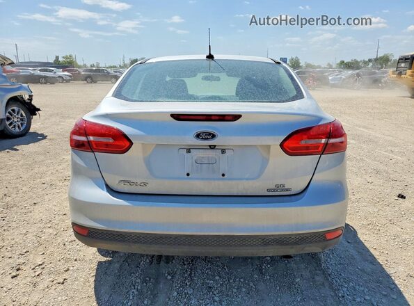 1FADP3F2XGL306158 2016 FORD FOCUS Silver Vista trasera