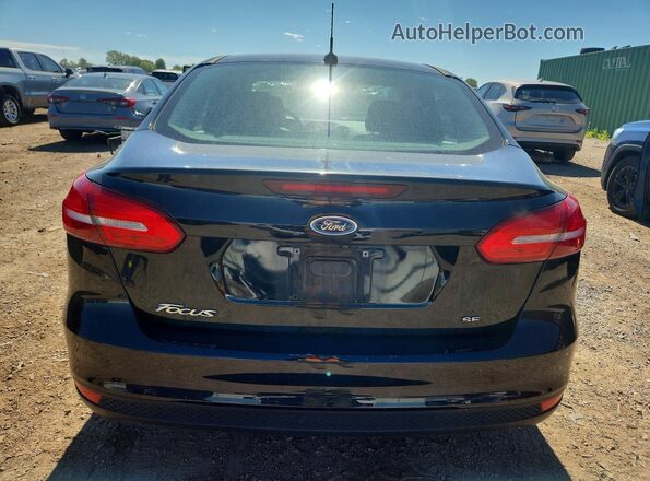 1FADP3F2XJL257051 2018 FORD FOCUS Black უკანა ხედი