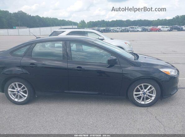 1FADP3F2XJL327583 2018 FORD FOCUS Black Rear interior view