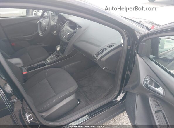 1FADP3F2XJL327583 2018 FORD FOCUS Black Front interior view