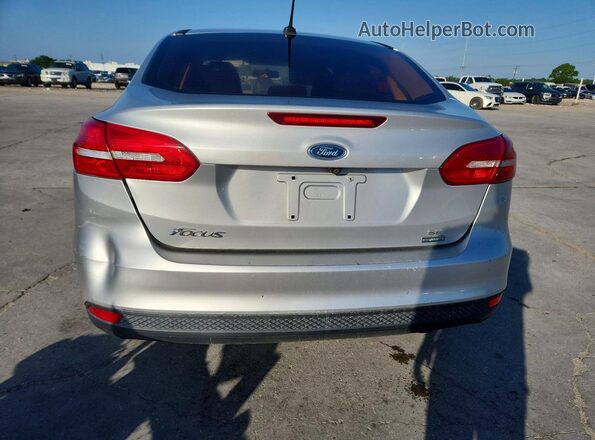 1FADP3FE7HL270747 2017 FORD FOCUS Silver Vista trasera