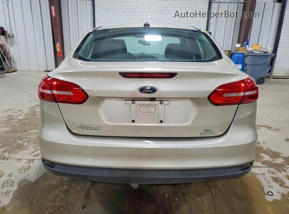 1FADP3FE7JL256921 2018 FORD FOCUS Cream Вид ззаду
