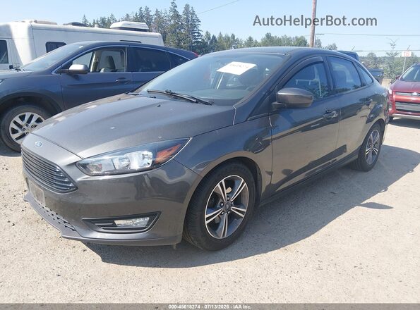 1FADP3FEXJL224576 2018 FORD FOCUS Gray Vista tres cuartos delantera izquierda