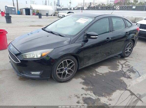 1FADP3H20JL270548 2018 FORD FOCUS Черный Передняя левая четверть