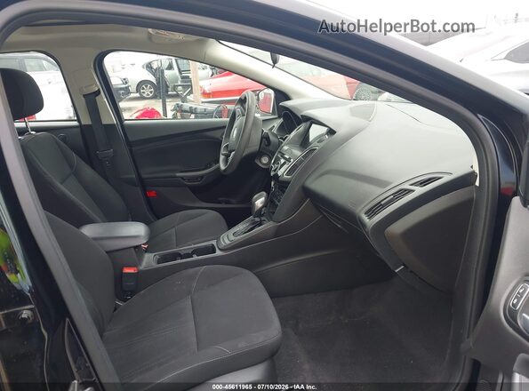 1FADP3H20JL270548 2018 FORD FOCUS Черный Вид салона спереди