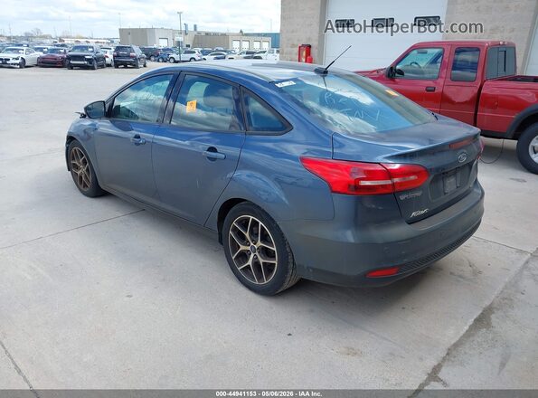 1FADP3H21JL300771 2018 FORD FOCUS Blue Rear left