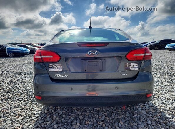 1FADP3H25JL243488 2018 FORD FOCUS Silver Հետևի տեսք