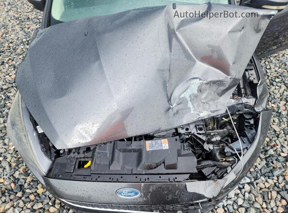 1FADP3H25JL243488 2018 FORD FOCUS Silver Սալոնի հետևի տեսք