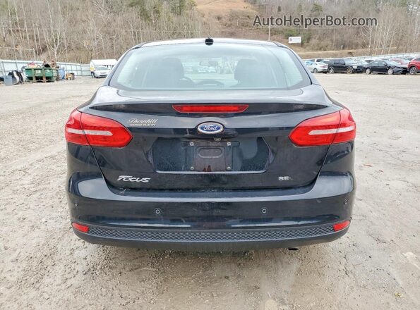 1FADP3H26JL268304 2018 FORD FOCUS Black Vista trasera