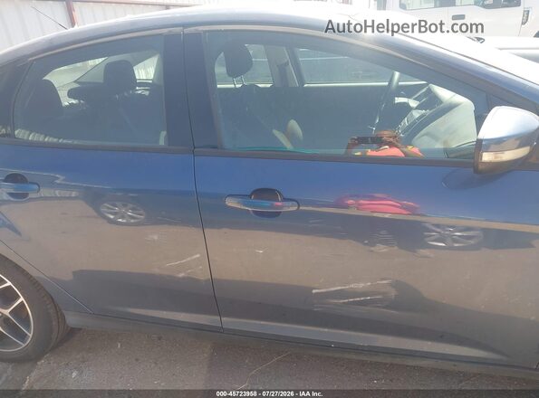 1FADP3H28JL259491 2018 FORD FOCUS Blue Rear interior view