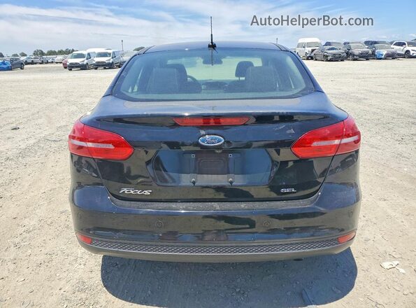 1FADP3H29JL279023 2018 FORD FOCUS Black Вид ззаду