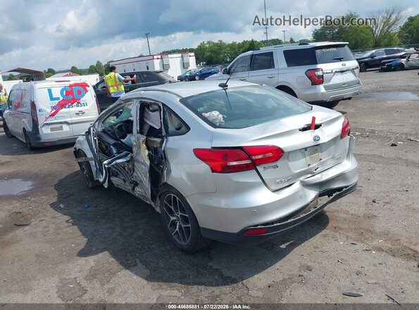 1FADP3H2XHL275380 2017 FORD FOCUS Silver Trasero izquierdo
