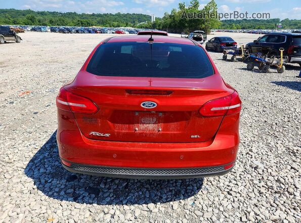 1FADP3H2XJL240604 2018 FORD FOCUS Orange Rear view