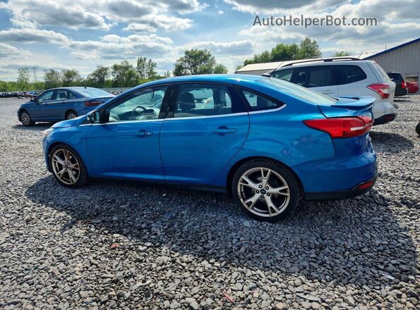 1FADP3J21GL233236 2016 FORD FOCUS Blue Rear left