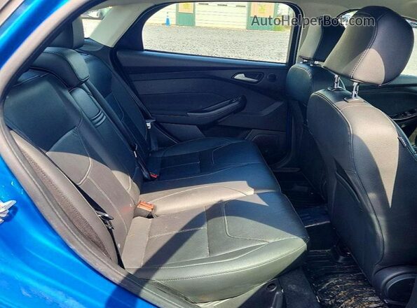 1FADP3J21GL233236 2016 FORD FOCUS Blue Rear seats view