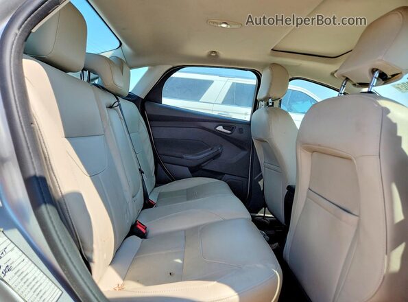 1FADP3J22HL288232 2017 FORD FOCUS Silver Vista de los asientos traseros