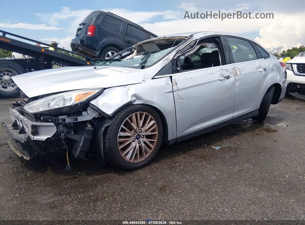 1FADP3J24GL296878 2016 FORD FOCUS Silver Przód lewy