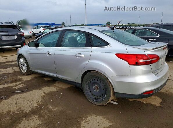 1FADP3J26GL252204 2016 FORD FOCUS Silver Trasero izquierdo