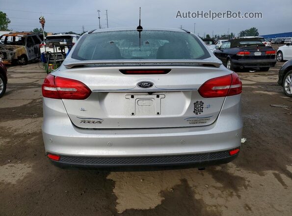 1FADP3J26GL252204 2016 FORD FOCUS Silver Vista trasera