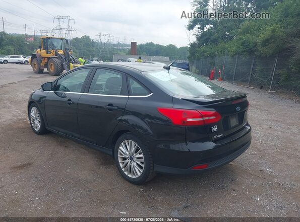 1FADP3J26HL256481 2017 FORD FOCUS Black Trasero izquierdo