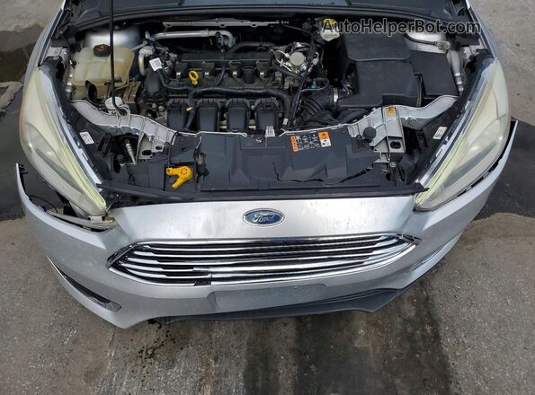 1FADP3J27HL346271 2017 FORD FOCUS Silver Вид задньої частини салону