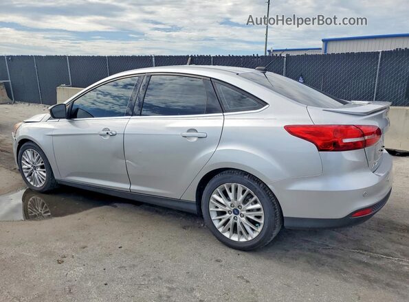 1FADP3J27HL346271 2017 FORD FOCUS Silver Задня ліва чверть