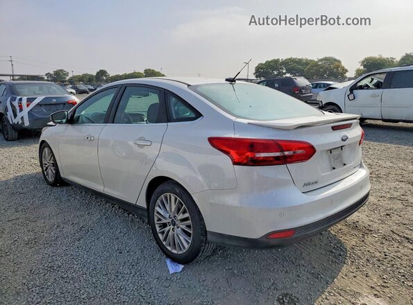1FADP3J2XGL306281 2016 FORD FOCUS White Rear left