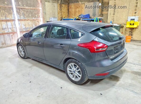 1FADP3K20JL324343 2018 FORD FOCUS Charcoal Trasero izquierdo
