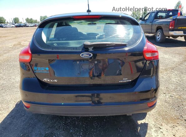 1FADP3K22GL223202 2016 FORD FOCUS Black Rear view
