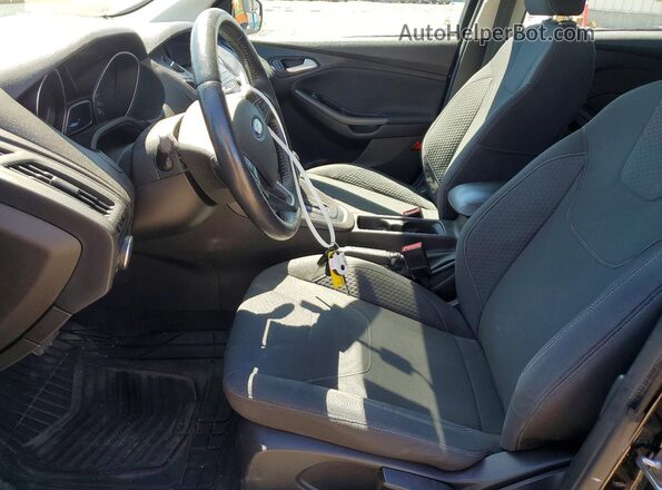 1FADP3K22GL223202 2016 FORD FOCUS Black Front interior view