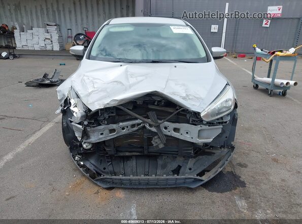 1FADP3K22HL319638 2017 FORD FOCUS Silver Вид задньої частини салону
