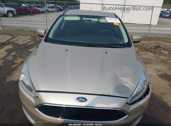 1FADP3K23JL308699 2018 FORD FOCUS Gold Vista del cuadro de instrumentos