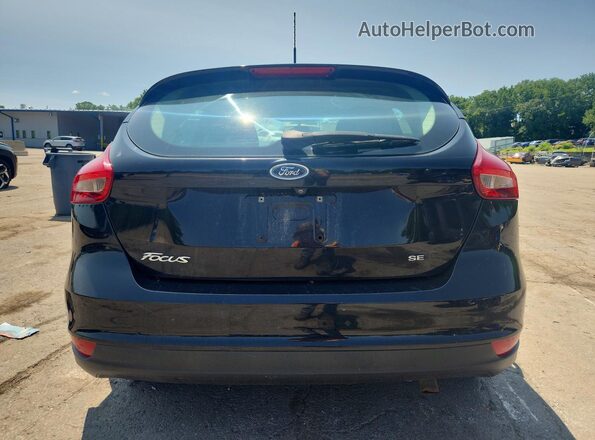 1FADP3K27HL335785 2017 FORD FOCUS Black Rear view