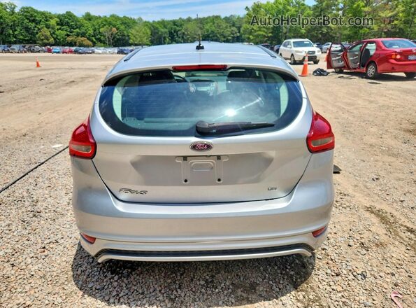 1FADP3K28GL402862 2016 FORD FOCUS Silver Vista trasera