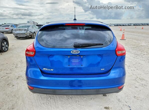 1FADP3K29JL302504 2018 FORD FOCUS Blue Rear view