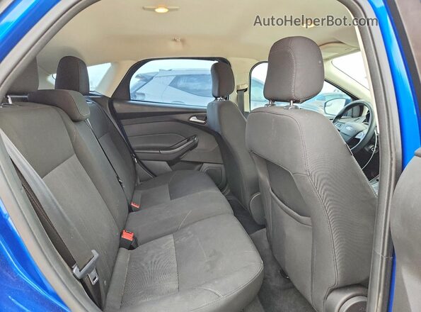 1FADP3K29JL302504 2018 FORD FOCUS Blue Rear seats view