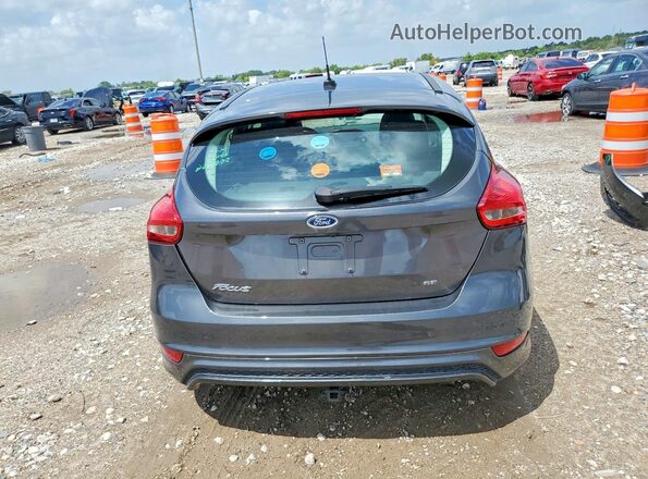 1FADP3K2XGL394215 2016 FORD FOCUS Gray Vista trasera