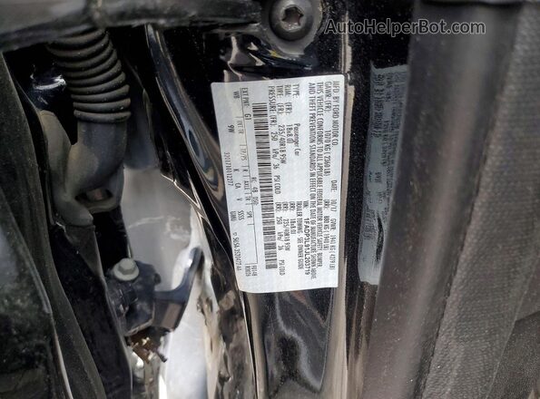 1FADP3L91JL203719 2018 FORD FOCUS Black VIN կոդի պիտակի տեսք