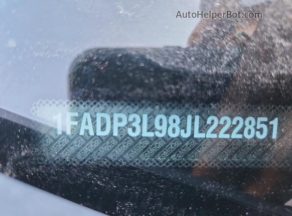 1FADP3L98JL222851 2018 FORD FOCUS Black Widok naklejki z numerem VIN